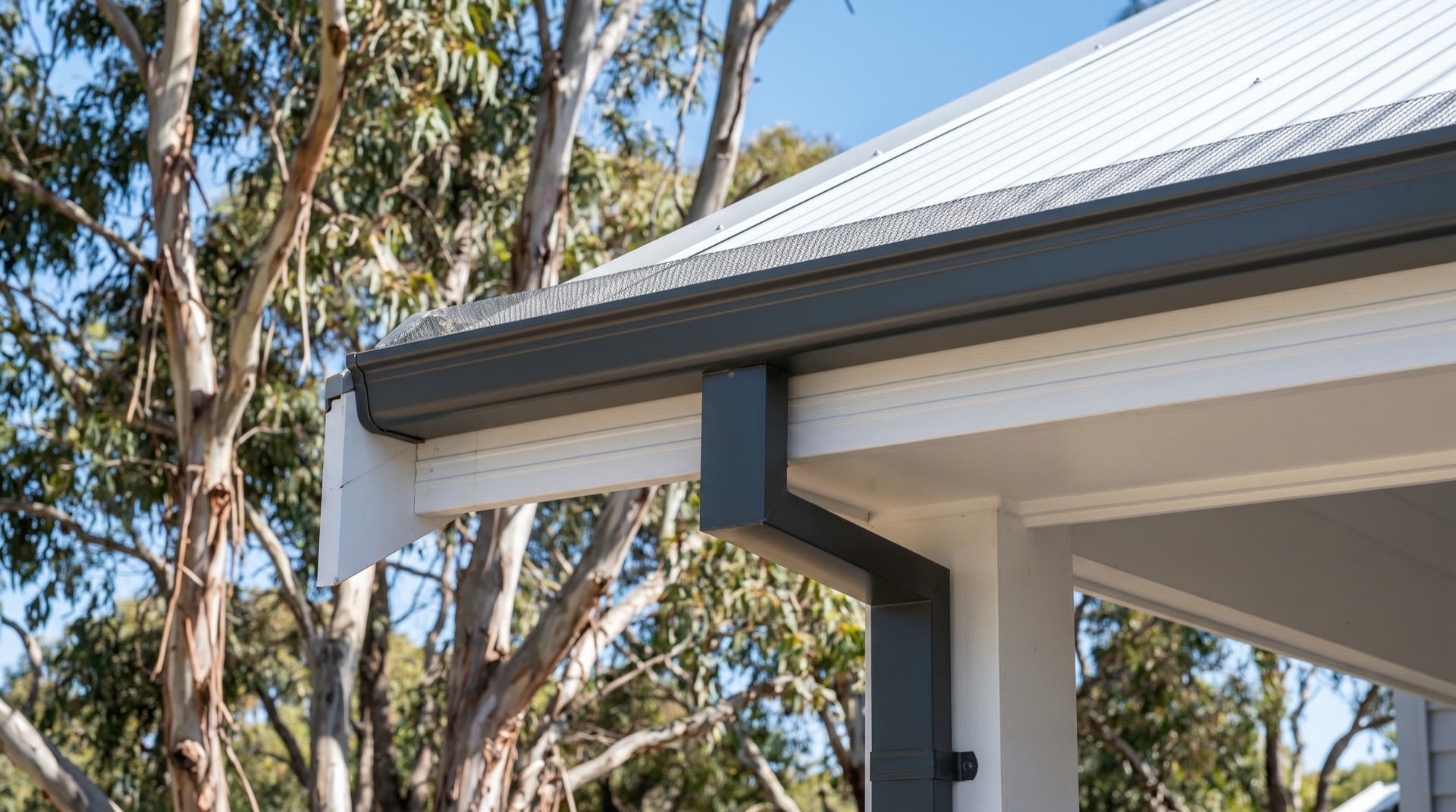 New Colorbond guttering and downpipes fitted to a coastal Sapphire Coast home