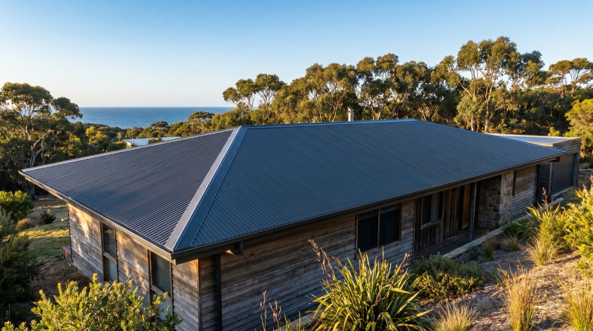 Full re-roof of a coastal home in Merimbula with new charcoal Colorbond